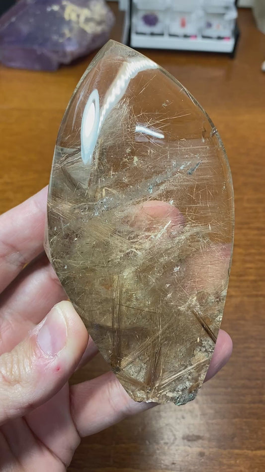 Rutile in Quartz (partially polished)